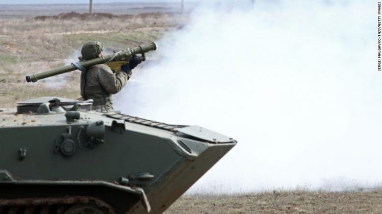 A Russian serviceman fires a Verba air defense system during an exercise at Opuk range in Crimea