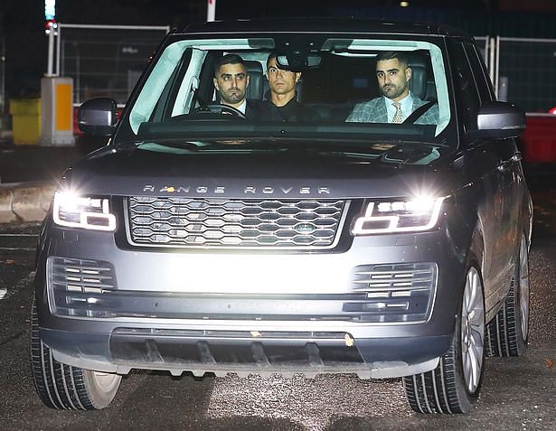 Cristiano Ronaldo with two bodyguards