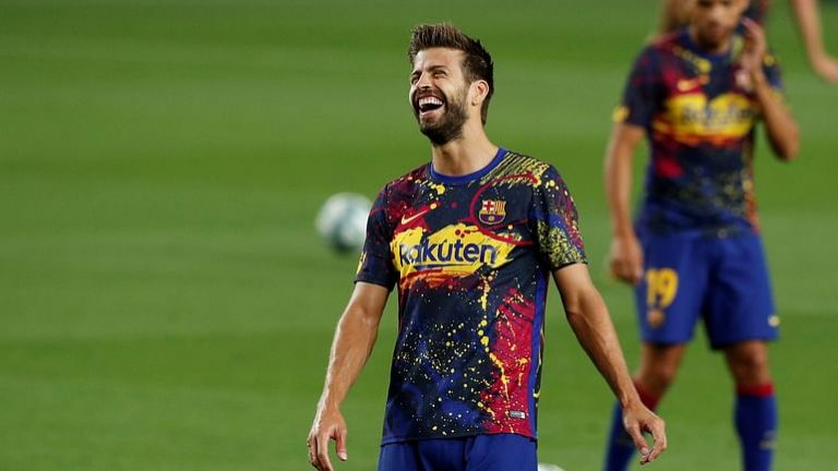 Barcelona's Pique pierced Real again