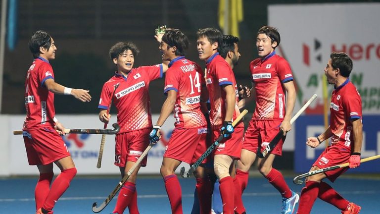 Cheers of the Japanese players after the victory