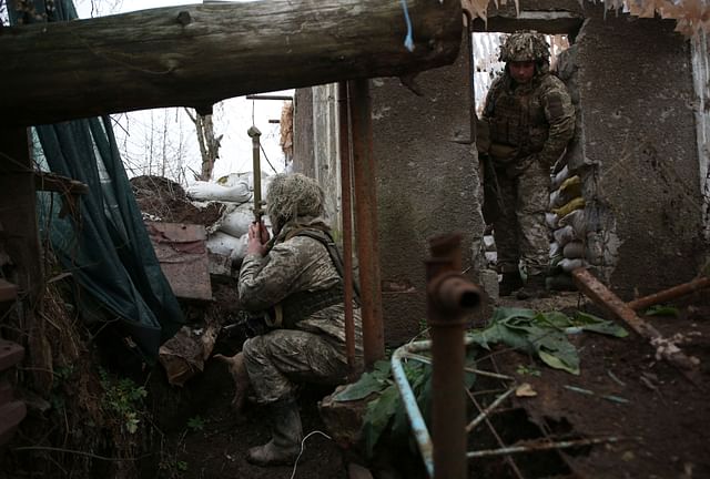 Ukrainian troops are keeping an eye on Russian-backed fighters. Near the town of Avadika in the Donetsk region of Ukraine