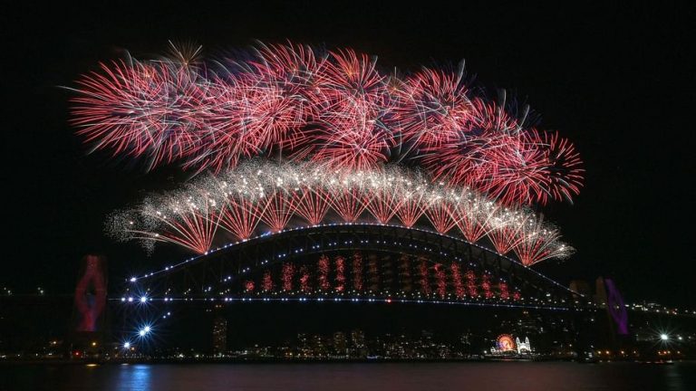 World rings in New Year under Covid cloud
